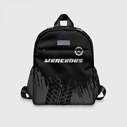 Детский рюкзак Mercedes speed на темном фоне со следами шин: симв