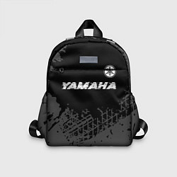 Детский рюкзак Yamaha speed на темном фоне со следами шин: символ